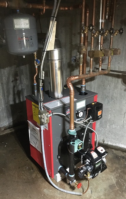 Nydam Oil's customer furnace inside home